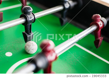 Close up of a foosball game with soccer ball 19045333