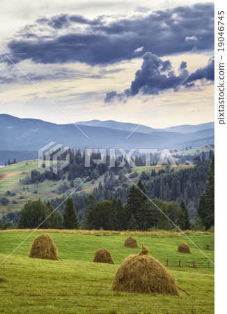 stacks of straw in mountain stacks of straw in mountain 19046745