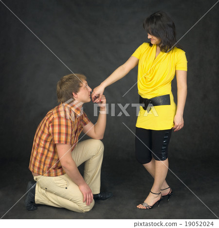 Man kisses a hand to the woman Man kisses a hand to the woman 19052024