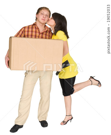 Girl kisses the guy holding a box 19052033