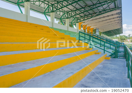 empty seat on cement grandstand empty seat on cement grandstand 19052470