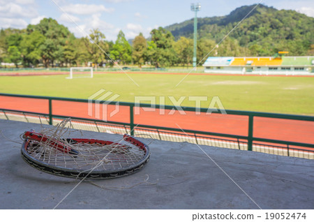 crack racket, crack cement ,blur arena background crack racket, crack cement ,blur arena background 19052474