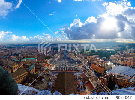 St. Peter's Square on cloudy sky, Vatican, Italy 19054047