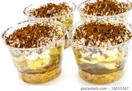 Banoffee pie in cups on white background Banoffee pie in cups on white background 19055367