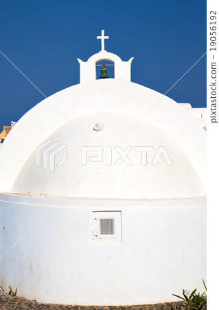 cross  in santorini greece old construction 19056192
