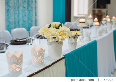 festive table decoration with flowers 19058998