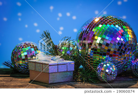 Christmas Mirror balls on wooden background Christmas Mirror balls on wooden background 19060874