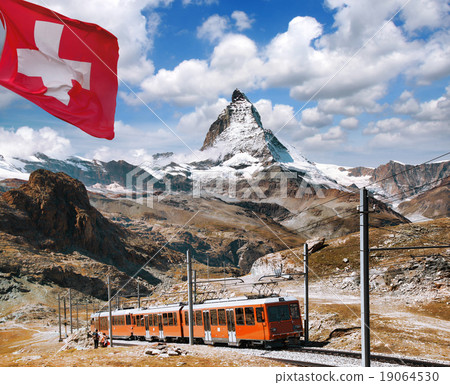 Matterhorn peak with a train in Swiss Alps 19064530