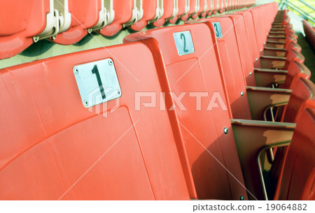 Empty red seating in sport stadium Empty red seating in sport stadium 19064882