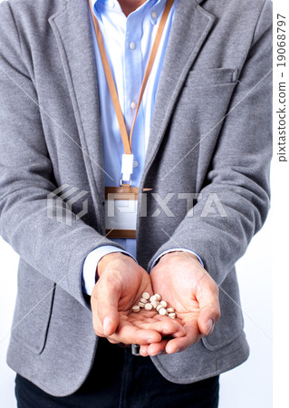 Men's hands with plenty of medicine Men's hands with plenty of medicine 19068797