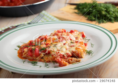 Baked fish with vegetables Baked fish with vegetables 19074148