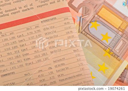 Close-up newspaper with of Euro banknotes Close-up newspaper with of Euro banknotes 19074261