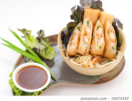 Rolls of vegetables and crispy dough with sauce 19074397