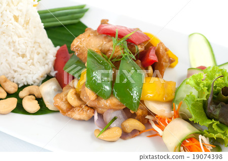 Fried chicken with cashew nuts and paprica Fried chicken with cashew nuts and paprica 19074398