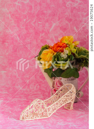 Decorative and a vase of flowers Decorative and a vase of flowers 19075624