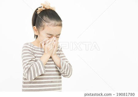 Girls sneezing Elementary school girls catching a cold Girls sneezing Elementary school girls catching a cold 19081780