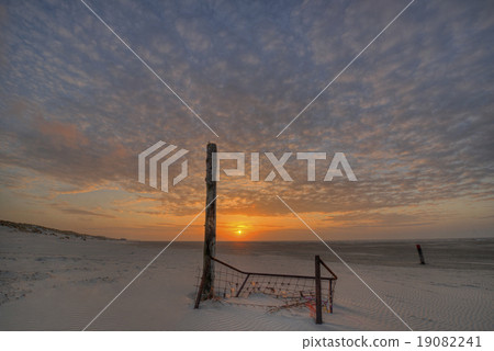 The North Sea Beach of Terschelling at sunset The North Sea Beach of Terschelling at sunset 19082241