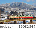 Going down the snowy nocturnal iron bridge Nagano Electric Railroad railroad train 2000 series 19082845