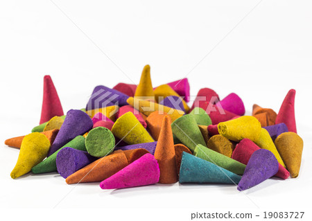 Colorful incense cones with white background Colorful incense cones with white background 19083727