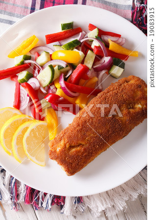 fried fish with vegetable salad and lemon fried fish with vegetable salad and lemon 19083915