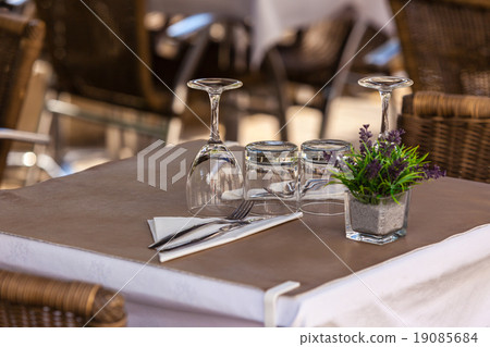 Cozy Restaurant tables ready for service Cozy Restaurant tables ready for service 19085684