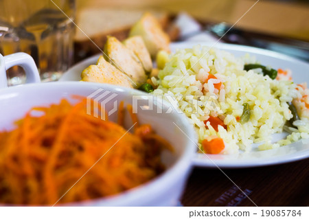 Salad of carrot and rice dish on the table Salad of carrot and rice dish on the table 19085784
