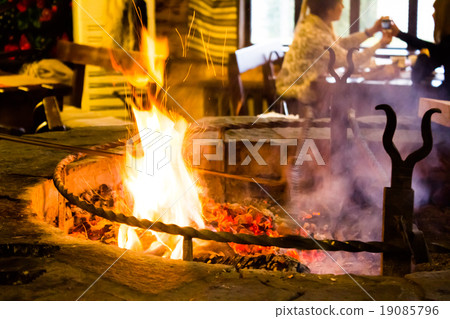 Meat is fried on fire in a restaurant Meat is fried on fire in a restaurant 19085796