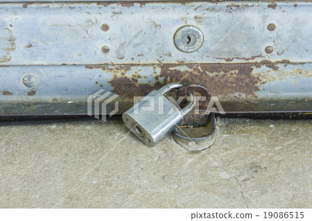 old shutter door with hasp - Key lock pad old shutter door with hasp - Key lock pad 19086515