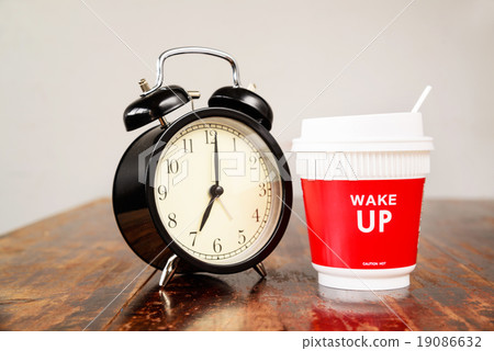 Alarm clock and coffee cup, Seven o'clock  19086632