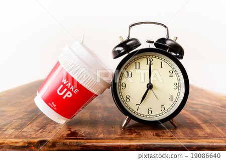 Alarm clock and coffee cup, Seven o'clock 19086640