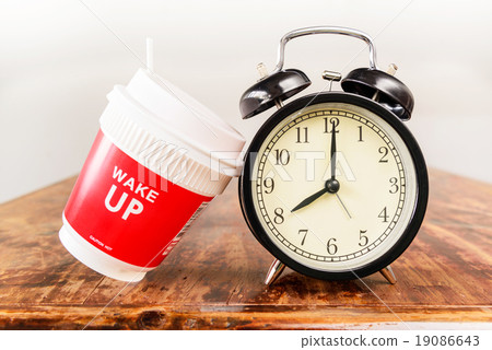 Alarm clock and coffee cup, Eight o'clock 19086643