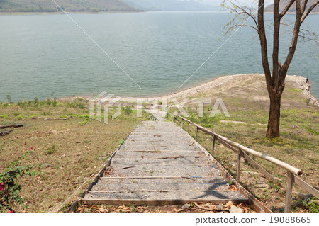 Stairs leading down to the water Stairs leading down to the water 19088665