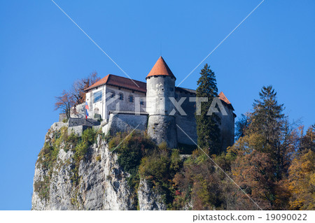 Bled Castle built on top of a cliff overlooking Bled Castle built on top of a cliff overlooking 19090022
