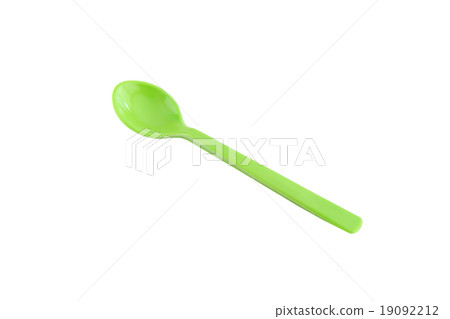 Green plastic spoon isolated on white. Green plastic spoon isolated on white. 19092212