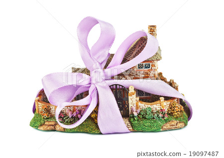 Toy house with bow as gift 19097487