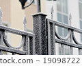 frozen fence winter day 19098722