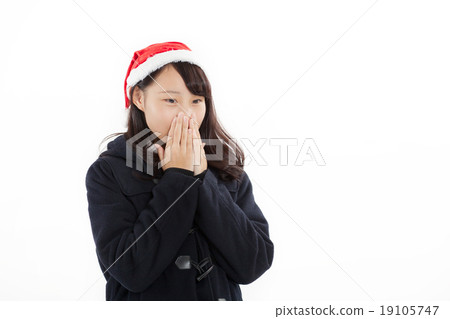 Pretty school girls wearing Santa's hat 19105747