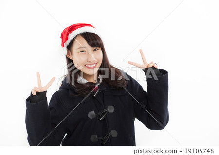 Pretty school girls wearing Santa's hat Pretty school girls wearing Santa's hat 19105748