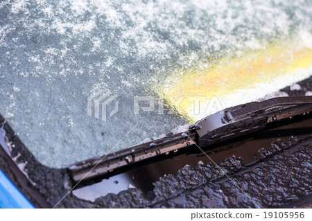 Closeup of a car covered in snow and ice Closeup of a car covered in snow and ice 19105956