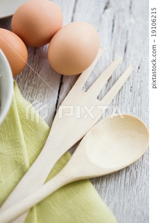 Fresh dairy products and eggs on rustic wood Fresh dairy products and eggs on rustic wood 19106215