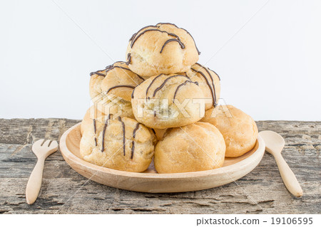 Choux Cream on wood Background 19106595
