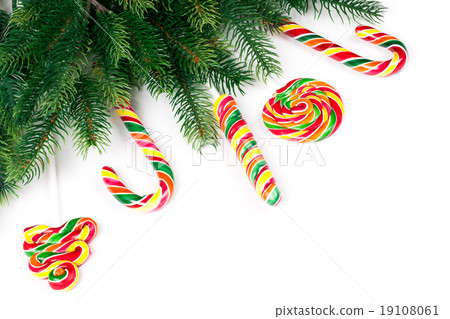 Christmas tree branches with decoration and candy 19108061