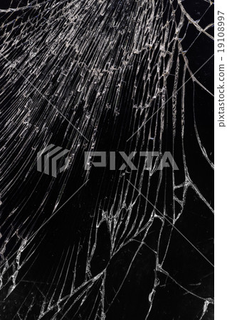Broken glass texture, cracked in the glass. Broken glass texture, cracked in the glass. 19108997