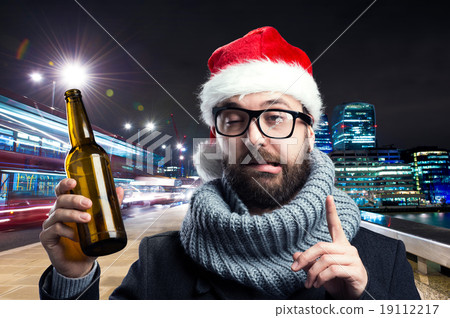 Young man with beer bottle 19112217