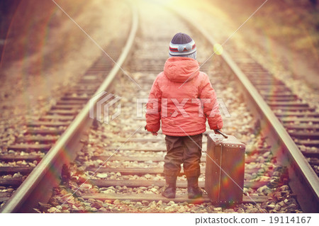 little traveler with a suitcase on the railroad little traveler with a suitcase on the railroad 19114167