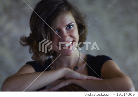 Portrait of a cheerful girl in a sexy blue Portrait of a cheerful girl in a sexy blue 19114309