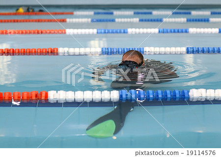 man teaches diving in the pool, swim coach man teaches diving in the pool, swim coach 19114576