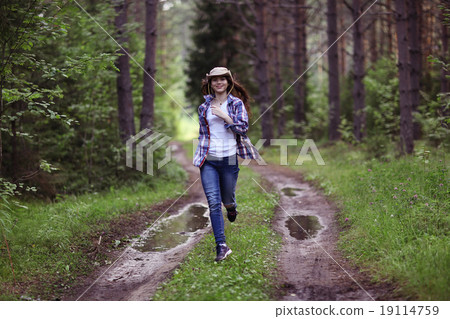 beautiful girl traveling in the woods 19114759