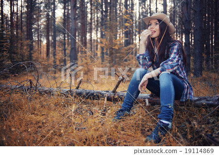 beautiful girl traveling in the woods 19114869