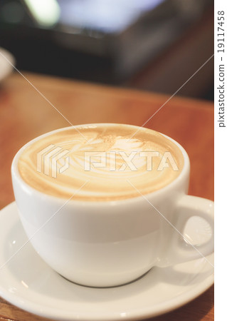 Cup of coffee latte art on wood table Cup of coffee latte art on wood table 19117458